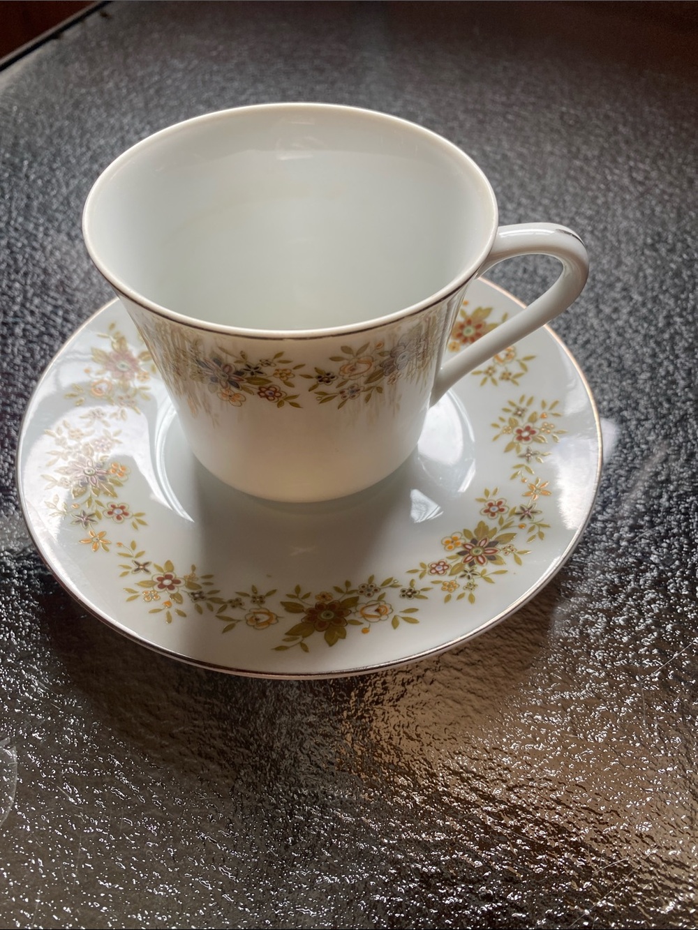 White Bone China Tea Cup and Saucer with Gold Floral Accent 1950